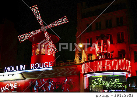 View of the Moulin Rouge at night in Paris, France 39125903