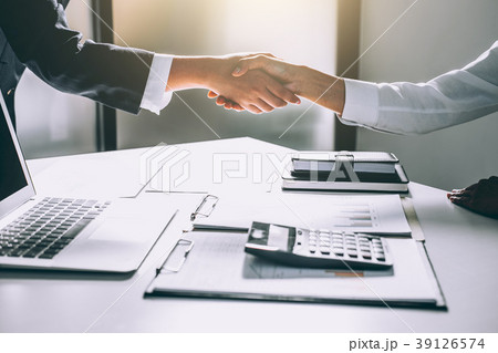 Teamwork process, Image of business team greeting handshake. Suc 39126574
