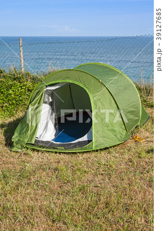 Green touristic tent near a sea by a sunny day 39127685