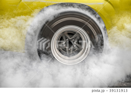 Drag racing car burn tire at starting line. Drag racing car burn tire at starting line. 39131913
