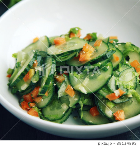 Chinese cucumber salad on the white plate Close up Chinese cucumber salad on the white plate Close up 39134895