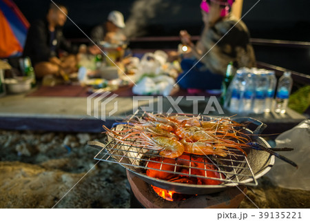 Grilling shrimp on stove Grilling shrimp on stove 39135221
