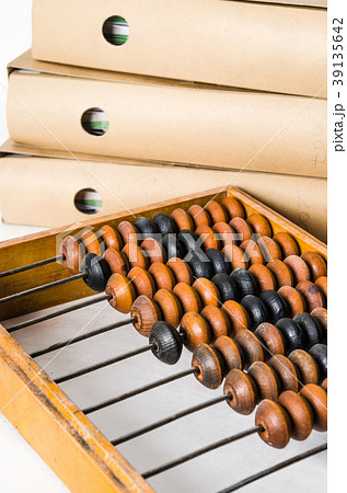 Old abacus and folders with documents 39135642