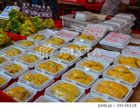 Selling durian fruits at street market Selling durian fruits at street market 39136318