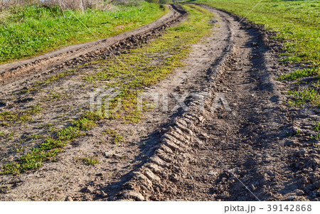 dirt road leading to the church. Russia dirt road leading to the church. Russia 39142868