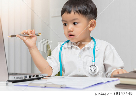 Young asian boy playing doctor  39147449