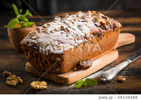 Sweet cake baked with dates, nuts Sweet cake baked with dates, nuts 39150488