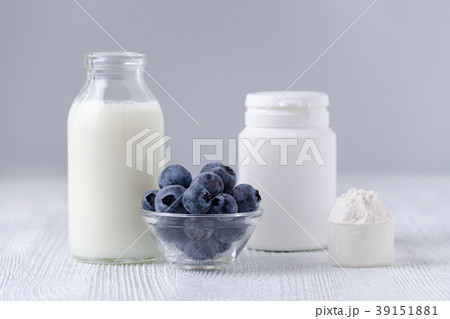 milk products and blueberrys on the table milk products and blueberrys on the table 39151881