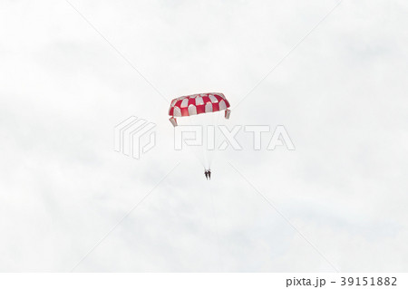 high parasailing in the sky with clouds high parasailing in the sky with clouds 39151882
