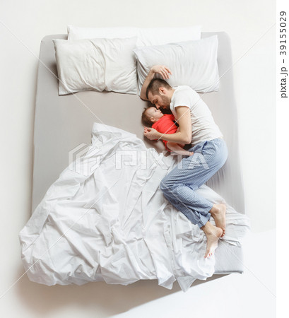 Top view of happy family with one newborn child in Top view of happy family with one newborn child in 39155029