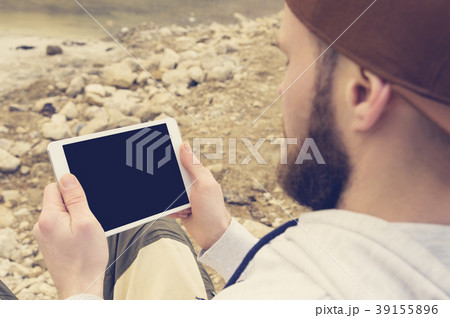 Close-up of a horde in a brown cap in the open air 39155896