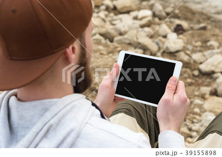 Close-up of a horde in a brown cap in the open air 39155898