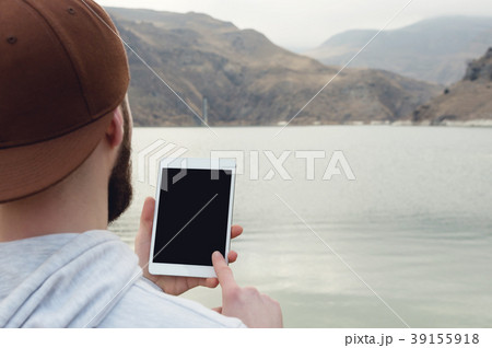 Close-up of a horde in a brown cap in the open air 39155918