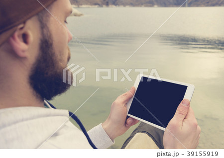 Close-up of a horde in a brown cap in the open air 39155919