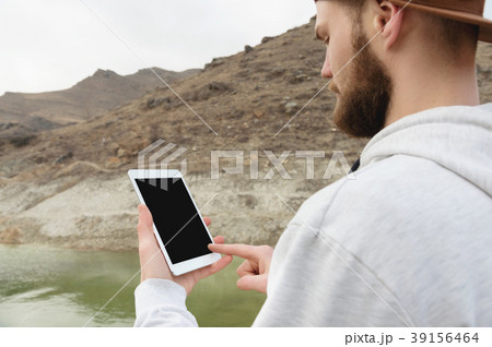 Close-up of a horde in a brown cap in the open air 39156464