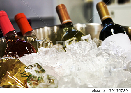 bottles of wine in the ice at the tasting   39156780