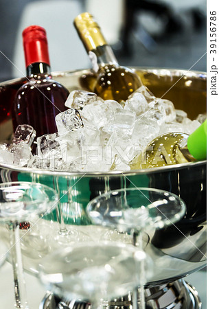 bottles of wine in the ice at the tasting   39156786