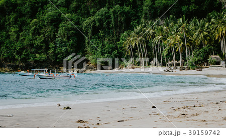 Crystal Bay, Palm trees on sandy beach with some 39159742