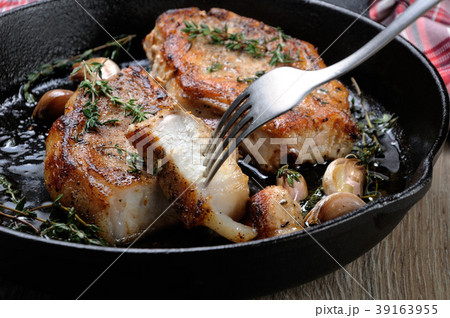 Roasted pork steak in frying pan   39163955