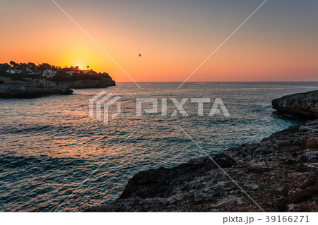 Sunrise at the rocky coast of Mallorca. 39166271