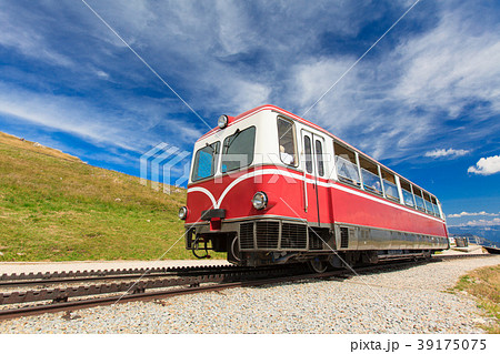 Steam train in a beautiful alpine landscape. Steam train in a beautiful alpine landscape. 39175075