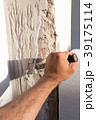 Breaking plaster during the reconstruction  39175114