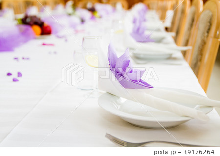 Violet wedding or reception table ready for meal 39176264