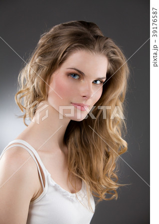 Portrait of beautiful blonde woman with great hair Portrait of beautiful blonde woman with great hair 39176587