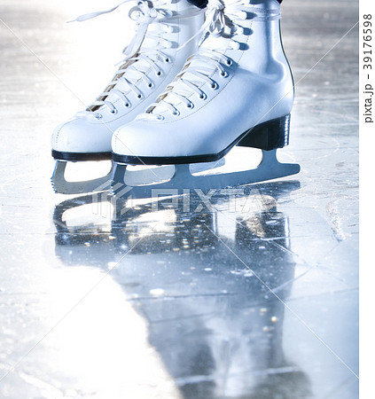 Dramatic blue portrait shot of ice skates 39176598