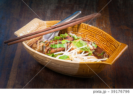noodle pork waterfall in bowl  on black background 39176796