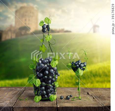 Bottle of Wine and a glass made by of grape leaves Bottle of Wine and a glass made by of grape leaves 39176829