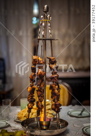 meat on skewers, camping with the cooking meat 39177452
