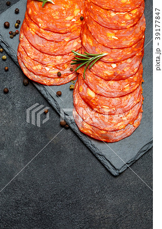 Italian Salami or spanish chorizo on serving board 39177847