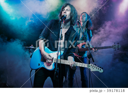 Performance of the rock band. 39178118