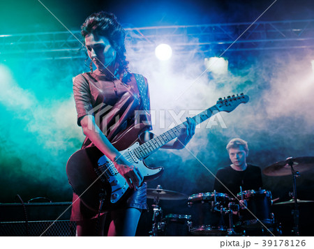 Performance of the rock band. 39178126