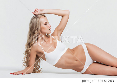 Girl in lingerie on white background 39181263