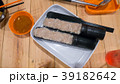 Minced pork for sukiyaki and sauce on wood table. 39182642