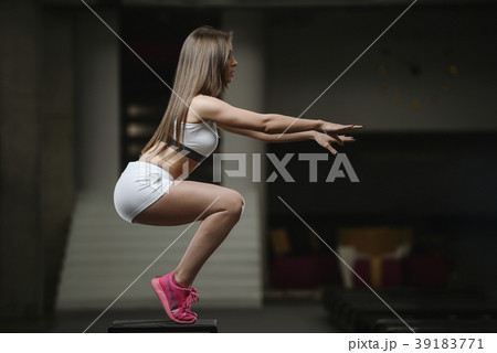strong sexy athletic young girl working out in gym strong sexy athletic young girl working out in gym 39183771