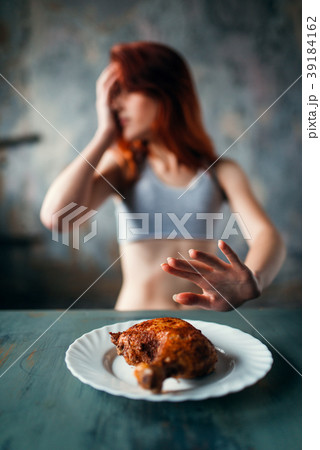 Skinny woman refuses to eat, anorexia 39184162