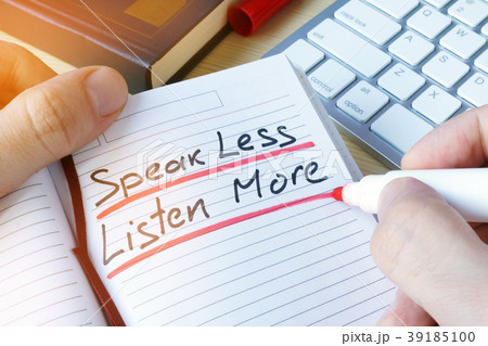 Man writing quote Speak less listen more. Man writing quote Speak less listen more. 39185100