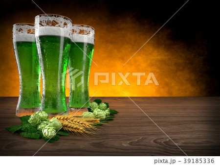 three glasses of green beer with barley and hops three glasses of green beer with barley and hops 39185336