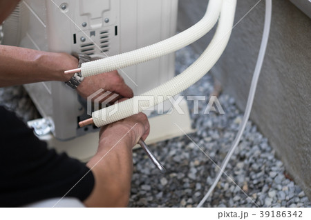 installation of an air conditioner installation of an air conditioner 39186342