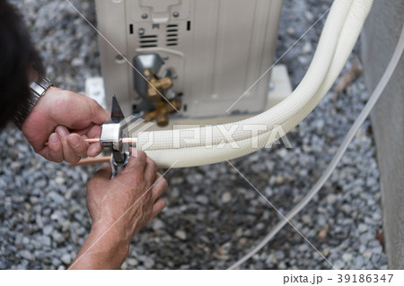 installation of an air conditioner installation of an air conditioner 39186347