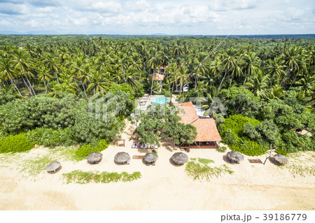 Aerial view of tropical beach with lonely hotel Aerial view of tropical beach with lonely hotel 39186779