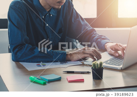 Businessman hand working with finances about cost 39189623