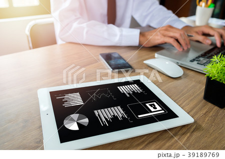 Businessman hand working with financial data 39189769