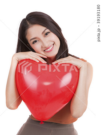 Asian pretty girl and a red heart on whitr islated Asian pretty girl and a red heart on whitr islated 39193180
