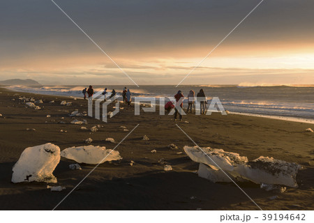 people on diamond black sand beach people on diamond black sand beach 39194642