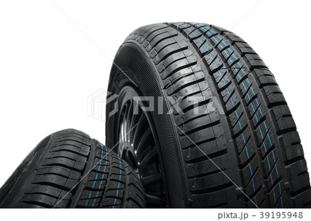 New and unused car tires against isolated New and unused car tires against isolated 39195948