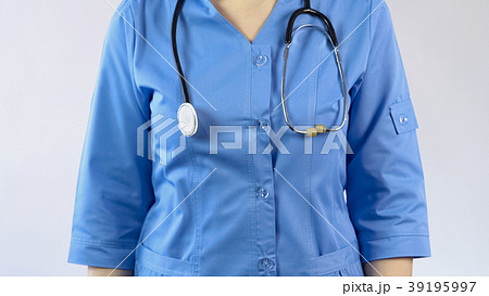 Female doctor in blue uniform with phonendoscope 39195997